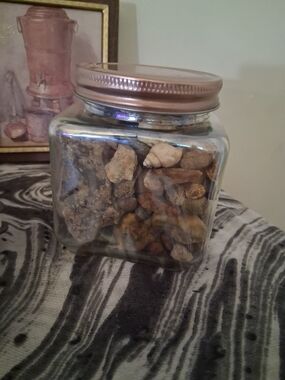 Glass Jar Filled With Beautiful Stones